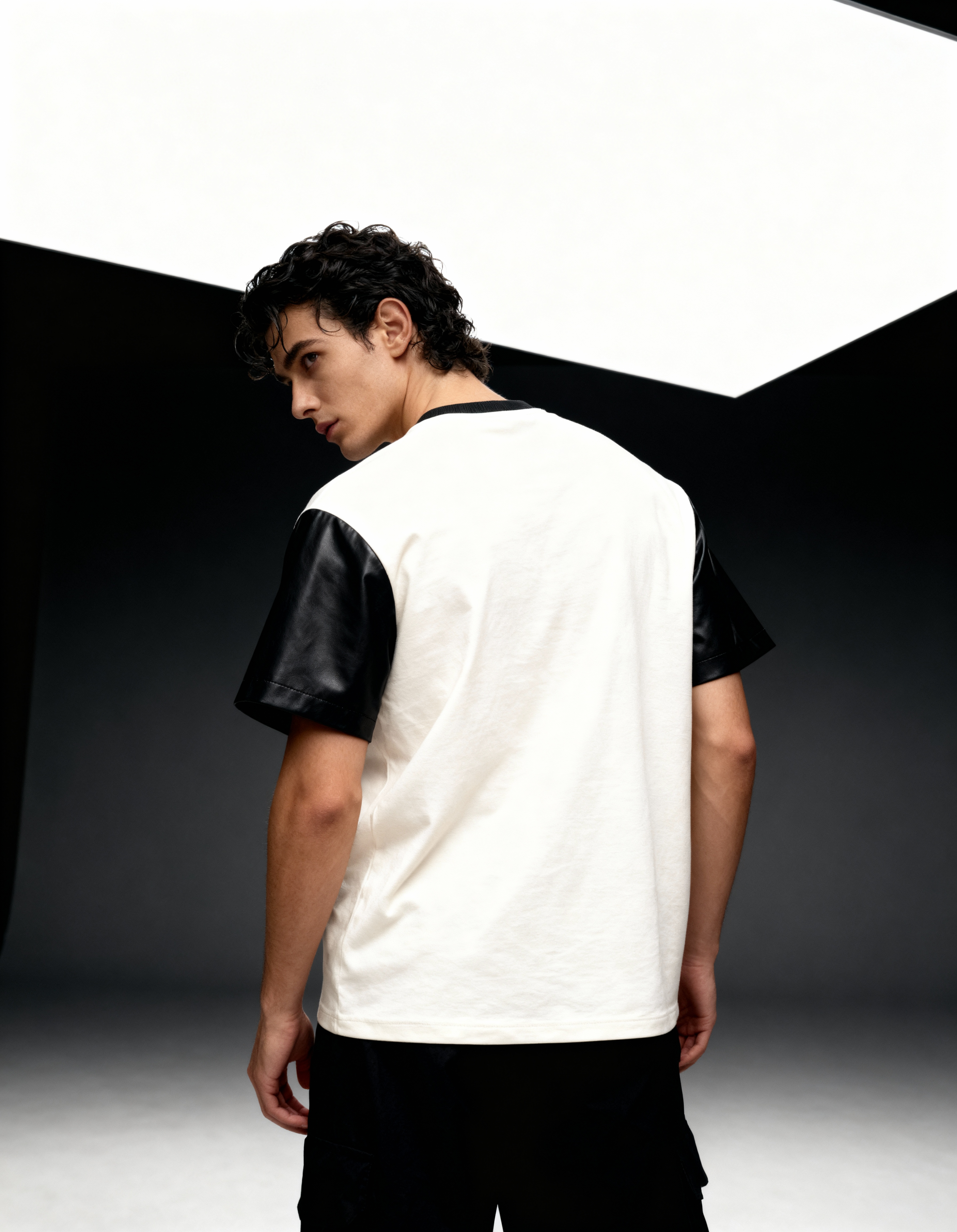 Trust No Limit Oversized Tee | Stylish Black Leather Sleeves Printed Tee Vasavi